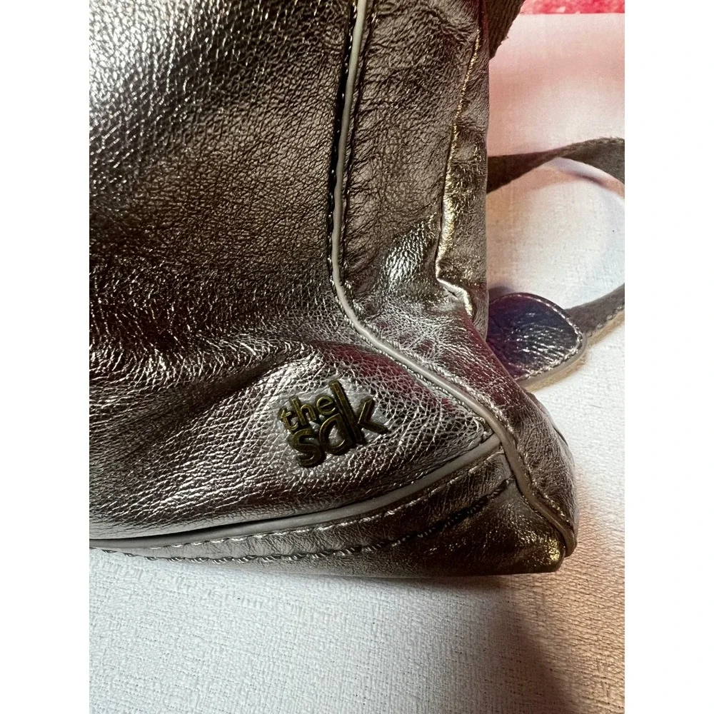 The Sak Metallic Pewter Leather Crossbody Bag Boho Charm Antiqued Brass Hardware